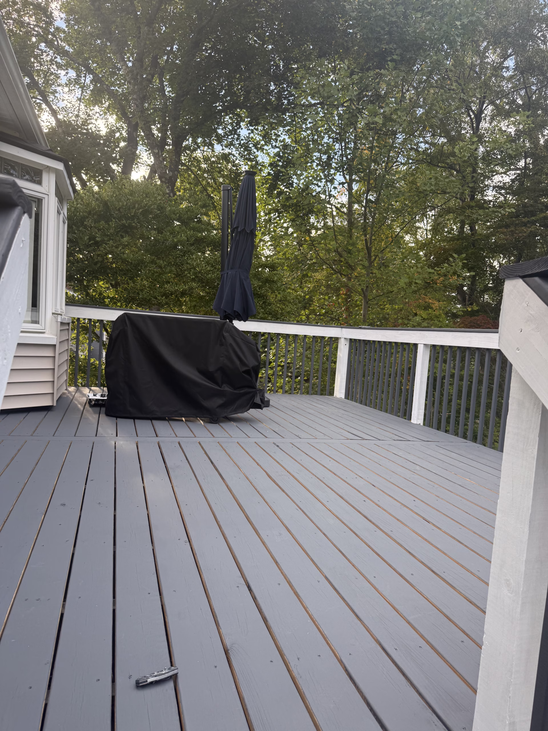 Finished deck painting project in Monroe CT with Benjamin Moore solid stain