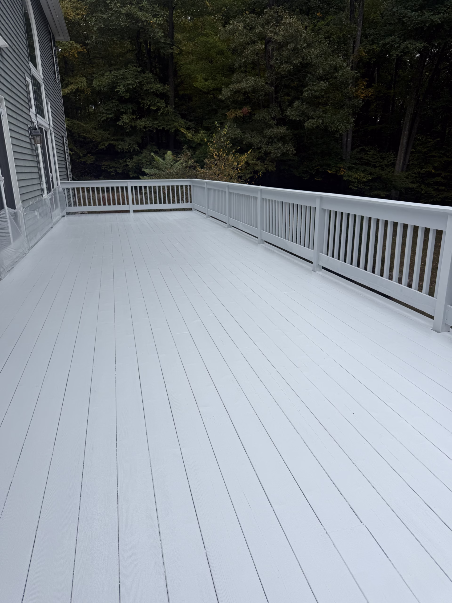 Finished deck in Redding CT after power washing carpentry sanding and solid stain