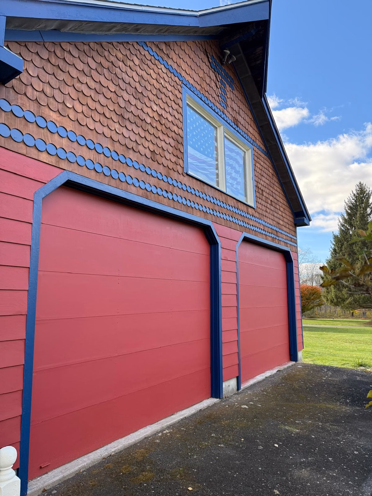 Garage after red solid stain and upper wood stain in Newtown CT