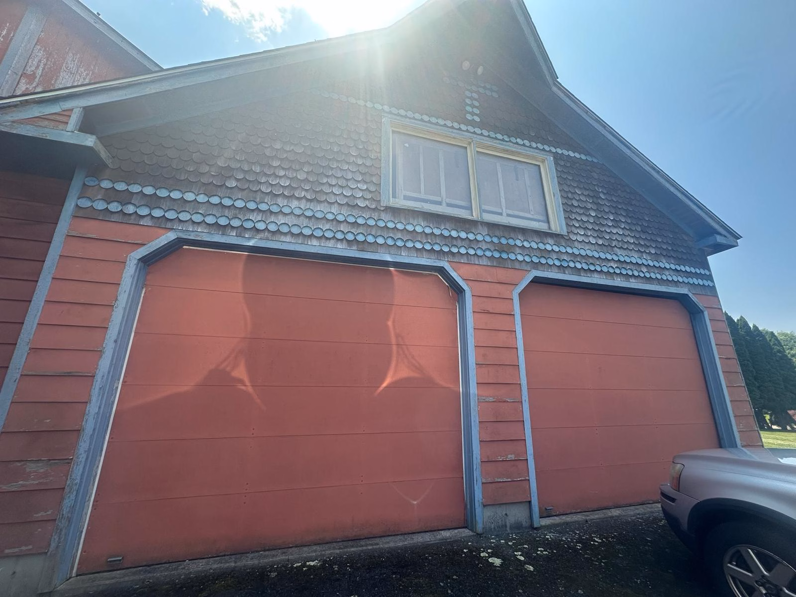 Garage before exterior refinishing in Newtown CT