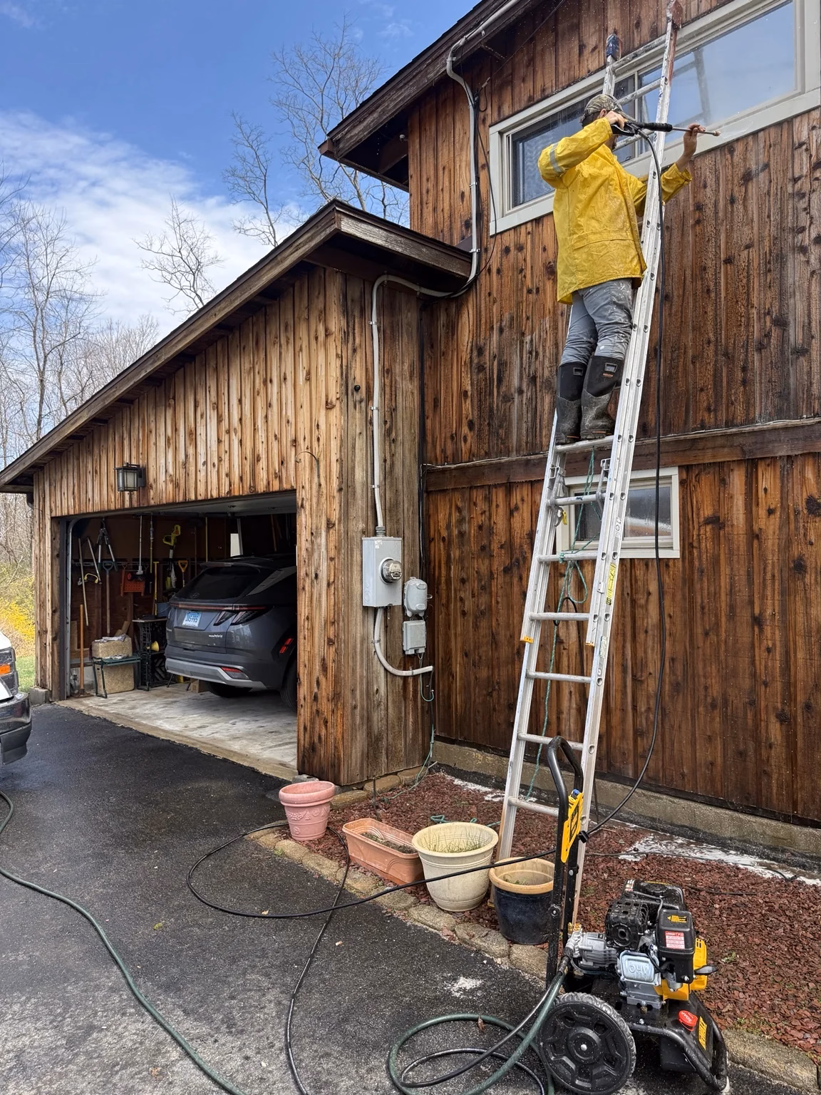 Power washing wood siding during preparation New Milford CT